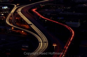 Using a long exposure to create light trails from cars on an interstate nearby. Nikon D7000 set to white balance of SUNNY and ISO of 100, shutter speed of 20 seconds at f/18, with exposure compensation at  -1.3, 70-300mm f/4.5-5.6 lens. Photo copyright Reed Hoffmann.