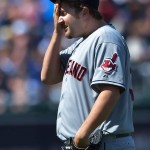 Cleveland's Matt Albers wipes his face after giving up a second walk. Photo by Reed Hoffmann, Copyright The Associated Press.