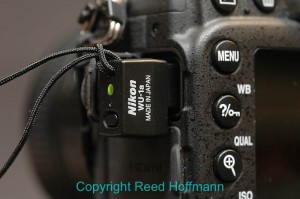 Nikon's WU-1a Wi-Fi adapter, used with the Nikon D7100. Photo copyright Reed Hoffmann.