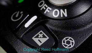 If you look, you'll usually find a button marked "+/-," which you hold down, then turn a control dial or wheel to increase or decrease exposure compensation. Photo copyright Reed Hoffmann.