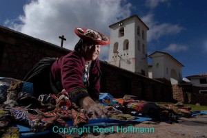 This woman was spreading out her wares in the main square at Chincheros. Nikon D200, ISO 100, 1/250 at f/16, Nikkor 12-24mm lens at 14mm. Photo copyright Reed Hoffmann.
